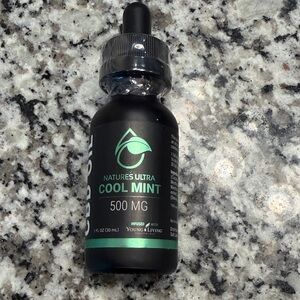 Young Living Nature's Ultra Cool Mint CBD Oil - Black and Green